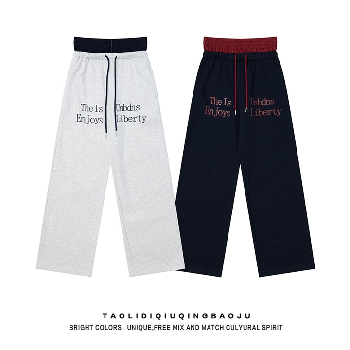 Pantaloni casual a due pezzi con cuciture a quadri finte