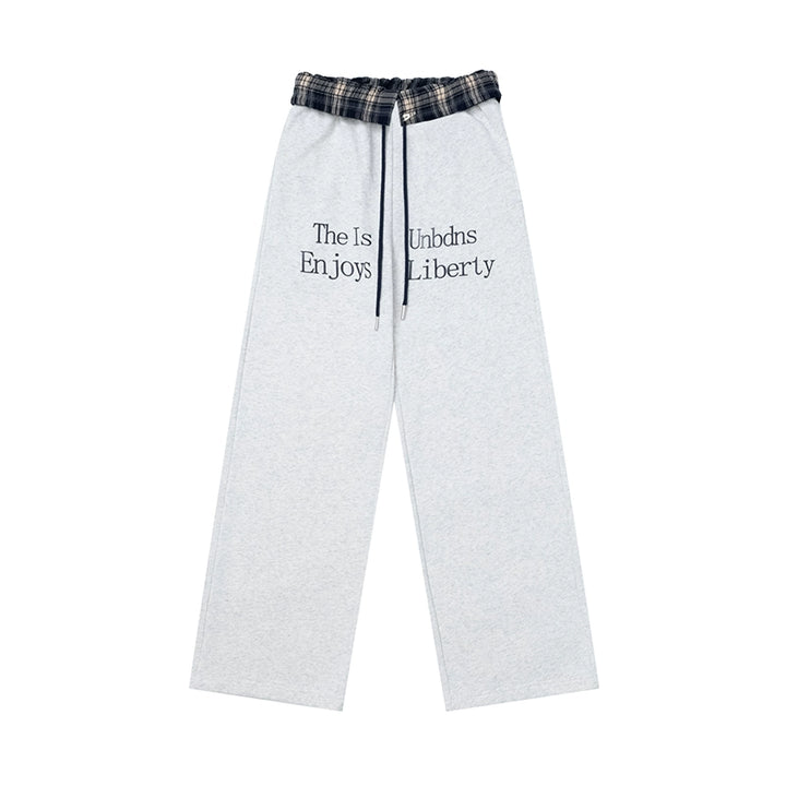 Pantaloni casual a due pezzi con cuciture a quadri finte